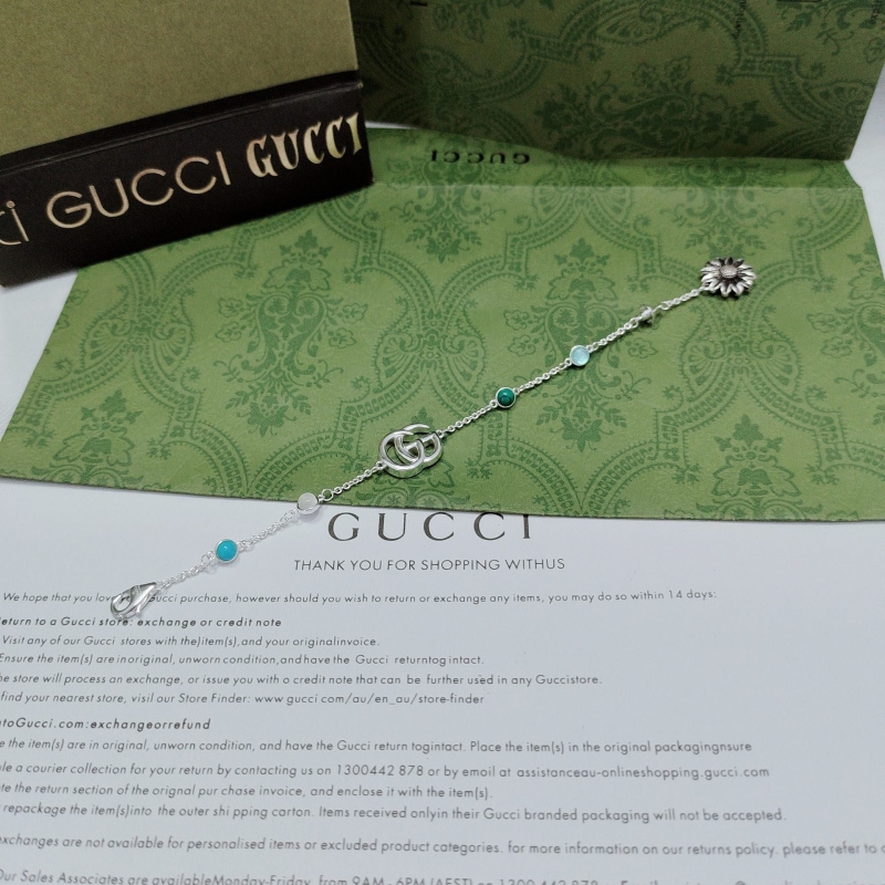 G*u*i bracelets